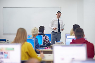 Image showing students with teacher  in computer lab classrom