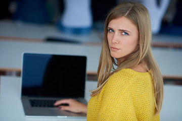 Image showing portrait of happy smilling student girl at tech classroom