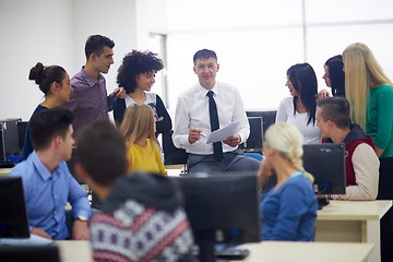 Image showing students with teacher  in computer lab classrom