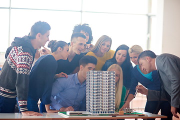 Image showing group of students with teacher on class