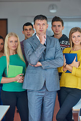 Image showing group portrait of teacher with students