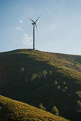 Image showing Wind turbine on a hill