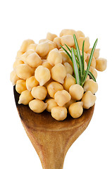 Image showing Chickpeas over wooden spoon