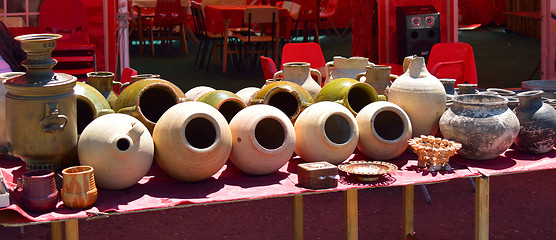 Image showing clay pots, jars and samovar for sale