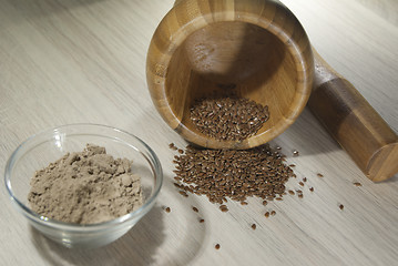 Image showing bowl with flax flour and mortar