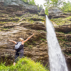 Image showing Active sporty woman relaxing in beautiful nature.