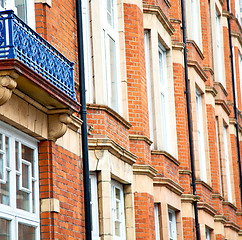 Image showing old window in europe london  red brick wall and      historical 