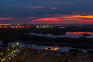 Image showing Evening Embankment. People waiting for show