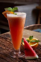 Image showing glass watermelon and orange smoothie