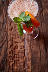 Image showing glass watermelon and orange smoothie