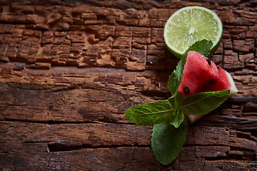 Image showing Watermelon, mint and lime on the wooden background