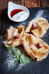 Image showing Crepes with raspberries
