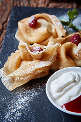 Image showing Crepes with raspberries