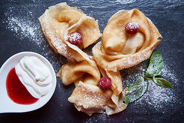 Image showing Crepes with raspberries