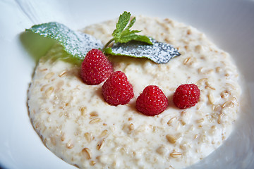 Image showing oatmeal with raspberries