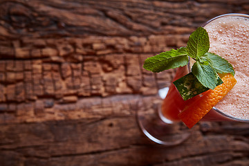 Image showing glass watermelon and orange smoothie