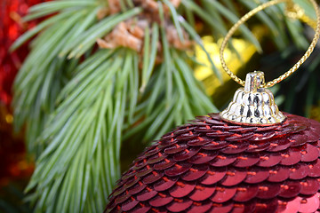 Image showing Christmas baubles on christmas tree. new year invitation card