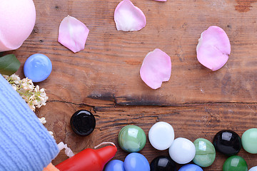 Image showing Spa composition with towels set, candles, flower petals, stones