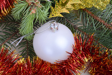 Image showing Christmas baubles on christmas tree. new year invitation card