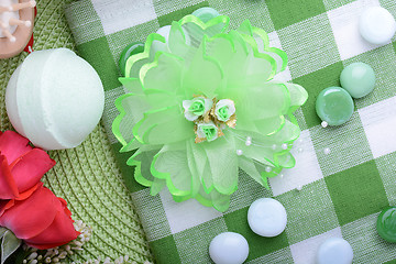 Image showing Spa stones, flower sea salt  on green and white towel