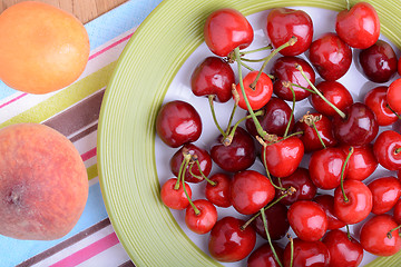 Image showing mandarin, peach and cherry fresh fruits and berries, summer health food, top view