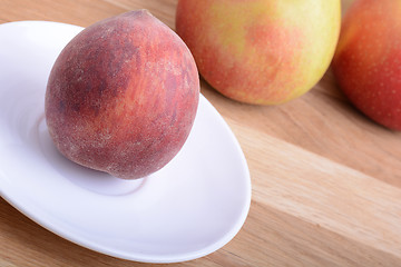 Image showing fruits on wodden table, peach, apple, food concept