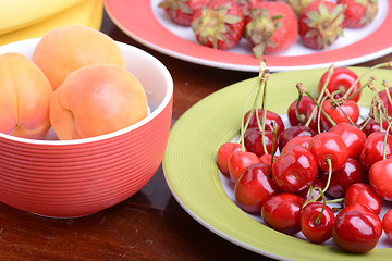 Image showing Fresh berries background: apricots, cherries, strawberry