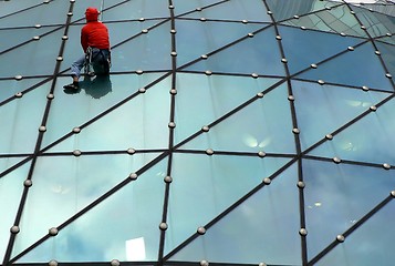 Image showing Climber on glass roof