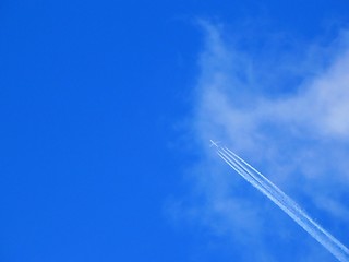 Image showing airliner with jet trail