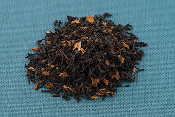 Image showing Black dry tea with petals