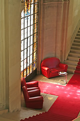 Image showing Sofas in waiting area with stained glass window
