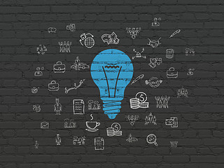 Image showing Finance concept: Light Bulb on wall background