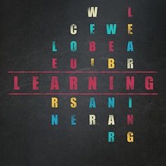 Image showing Learning concept: word Learning in solving Crossword Puzzle