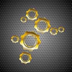 Image showing Golden gears on perforated metal background