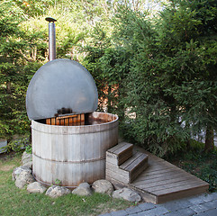 Image showing Wooden hot tub in the alps