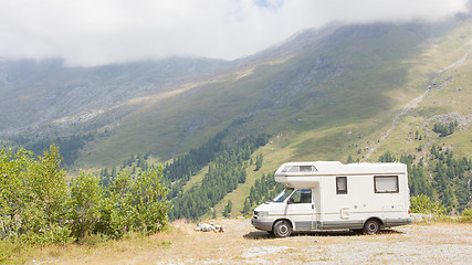 Image showing Camper van parked high in the mountains