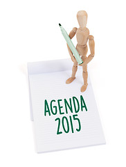 Image showing Wooden mannequin writing - Agenda 2015