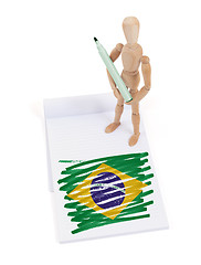 Image showing Wooden mannequin made a drawing - Brazil