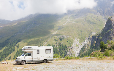 Image showing Camper van parked high in the mountains