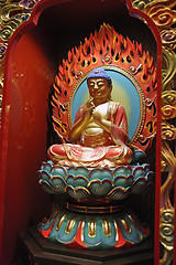 Image showing Golden statue of buddha inside a chinese temple