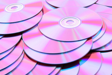 Image showing Many pink DVDs or CDs