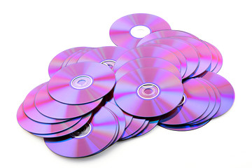 Image showing Pile of colorful DVDs or CDs on white background