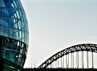 Image showing Rounded glass building and Tyne bridge
