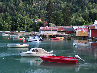 Image showing Boats in harbor and calm water