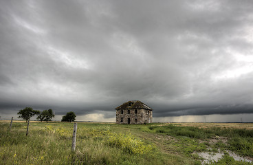 Image showing Storm Clouds Prairie Sky stone house