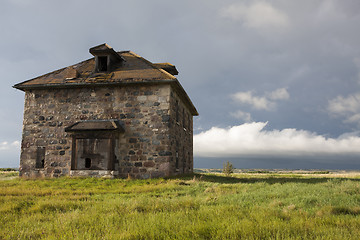 Image showing Storm Clouds Prairie Sky stone house