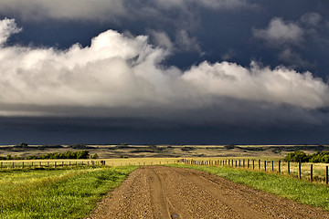 Image showing Storm Clouds Prairie Sky Gravel Road