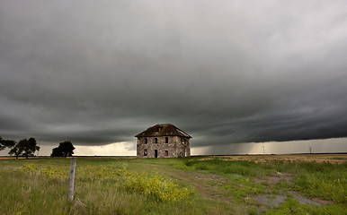 Image showing Storm Clouds Prairie Sky stone house