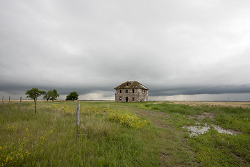 Image showing Storm Clouds Prairie Sky stone house