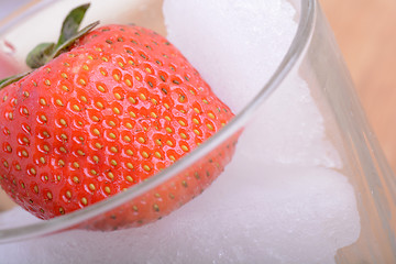 Image showing strawberry frozen in ice cube, health food concept